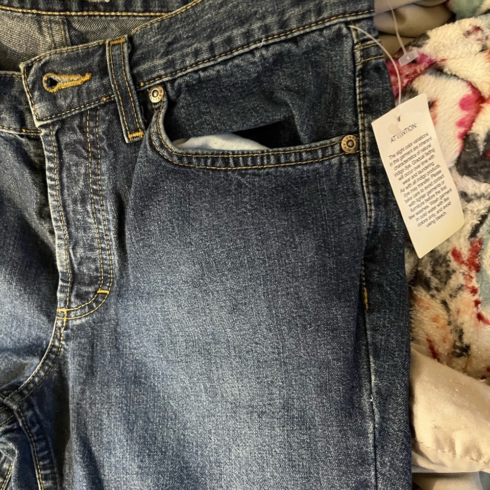MAVI : buttonfly jeans .